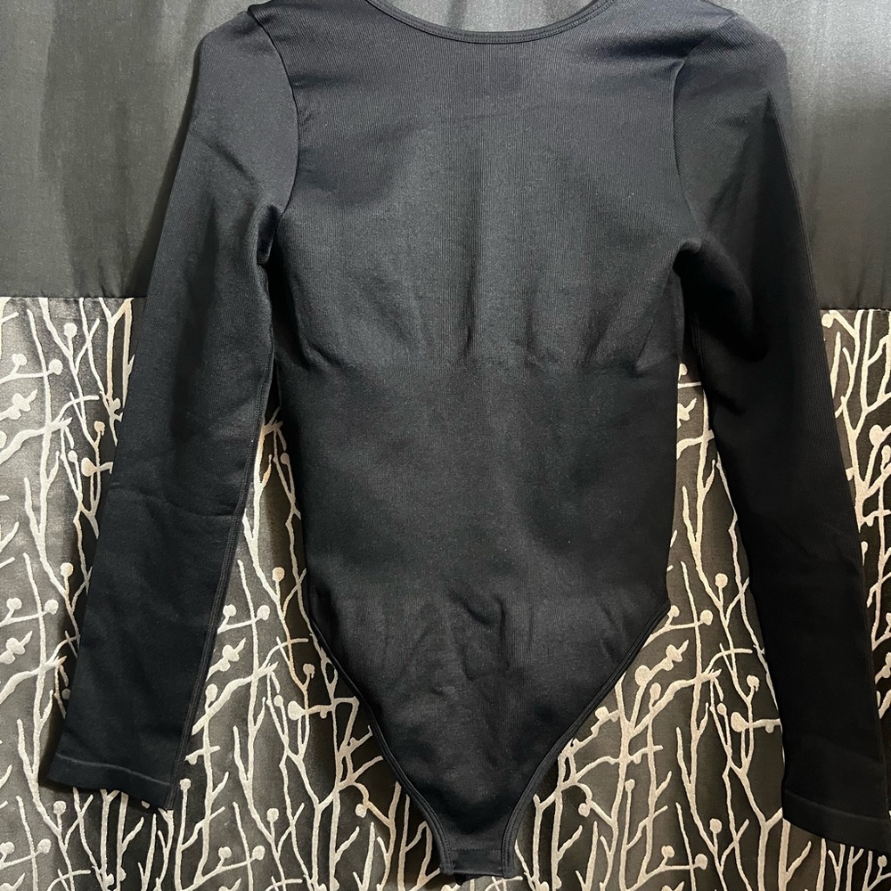 OGG Ladies size Large Black Bodysuit with plunging Back
